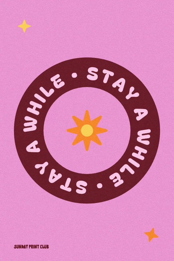 Stay a While print: the words stay a while repeated around a burgundy ring with an orange sunburst center on lilac